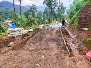 Pembangunan jalan satapak di desa tribaktimulya menuai polemik